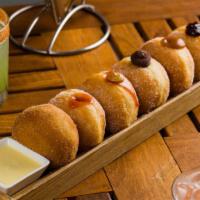 6 Flex Donuts · vanilla bean dipping sauce, choice of six flavors