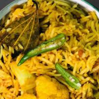 Vegetable Biryani · Vegetable Biryani is a delicious savory rice dish loaded with spicy marinated veggies, caram...