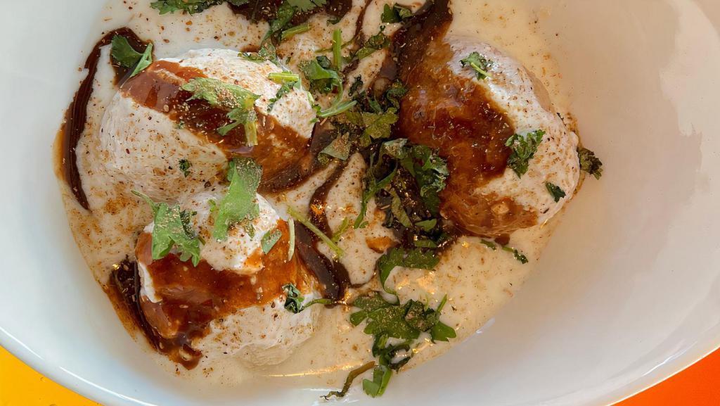 Dahi Bhalla Chaat · Deep fried lentil fritters dunked in yogurt and topped with chutneys! popular street snack in India!