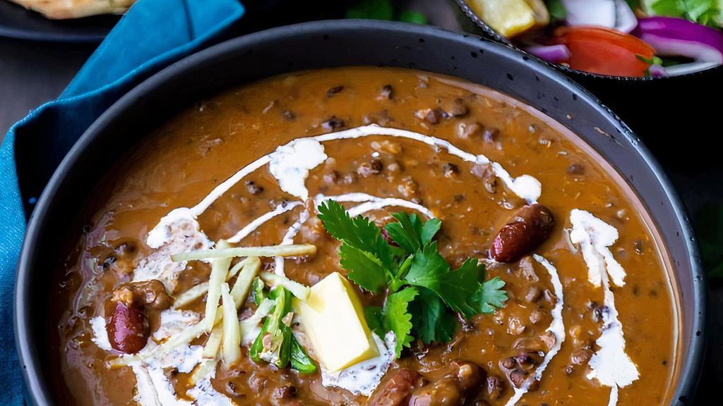 Dal Makhani · Dal Makhani consist of whole black lentil, red kidney beans and cream cooked together in Authentic Indian Spices