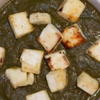 Palak Paneer · Soft Cheese Chunks made in spinach-based curry and authentic Indian Spices. It contains some...