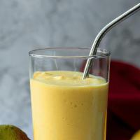 Mango Lassi 16 Oz · Mango Lassi is a delicious creamy drink with mango, yogurt, milk, a little sugar, and a spri...