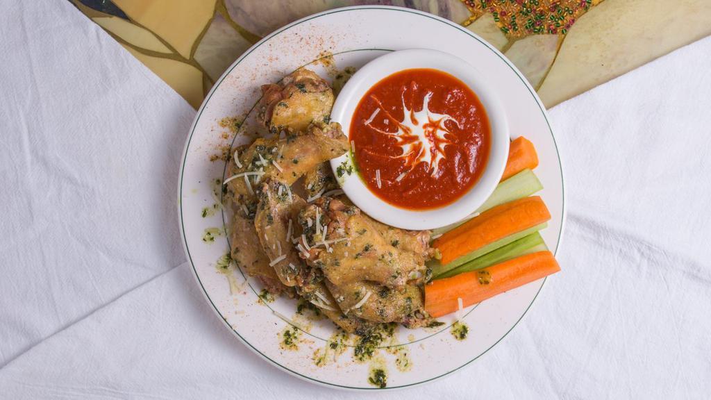 Dy-No-Mite Chicken Wings · All served with celery and carrots. Choose your favorite.