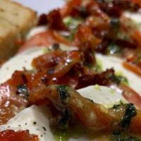 Fresh Mozzarella Platter · Fresh mozzarella, sun dried tomatoes, sliced tomatoes, roasted red peppers and fresh basil w...