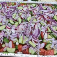 Fattoush Salad · Romaine lettuce, tomatoes, cucumbers, radishes, mint, pita chips, sumac, red vinegar, olive ...