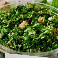 Tabouleh Salad · Homemade with cracked wheat, parsley, tomatoes, onions, olive oil, lemon & mint