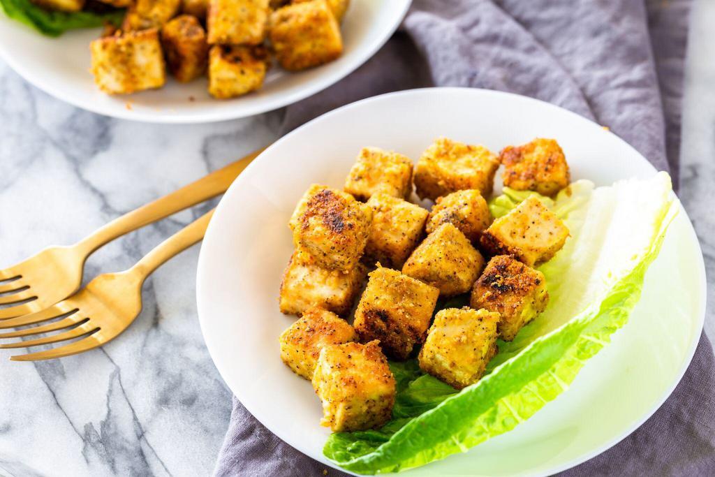 Curry Spiced Tofu (Vegan) · Bite-sized firm tofu cubes seasoned with curry powder, turmeric, ginger, garlic, and chili powder.