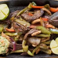 Fajitas Mixtas · Grilled shrimps, chicken and beef sauteed with onions, red and green bell pepper, mushrooms ...
