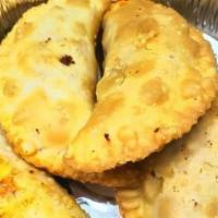 Chicken Samosa · Chicken filled pastry turnover. Four pieces