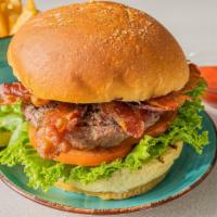Blt Burger · A 1/4 lb. burger with lettuce, tomato, and mayonnaise topped with three pieces of crispy bac...