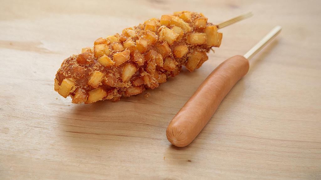 9 Potato Hot Dog · This is our classic dog with a delicious twist. It is made fresh with an all-meat sausage and breaded with our special dough made from Korean rice flour then covered with diced potatoes.