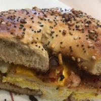 Bacon, Egg & Cheese Bagel · Two eggs with sharp melted cheddar and thick cut applewood smoked bacon.