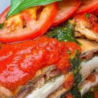 Eggplant Rollatini Appetizer · Two per order. Fresh battered eggplant rolled with seasoned ricotta, baked parmigiana style ...