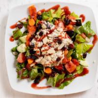 Cranberry Chicken · Chicken salad, cranberries, almonds, field of greens (tomatoes, cucumbers, chick peas, roast...
