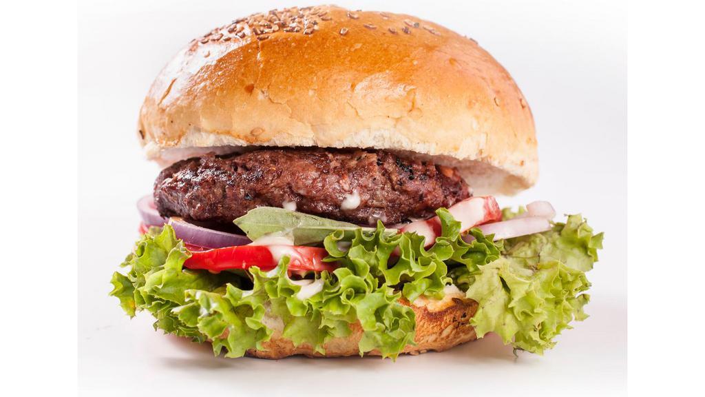 Classic Burger · Delicious homemade Beef patty served on a toasted bun with lettuce, grilled onions, pickles, and tomato.