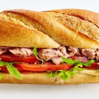 The Lamb Cheesesteak Sandwich  · Cheese Melted onto Hot Slices of Lamb.
