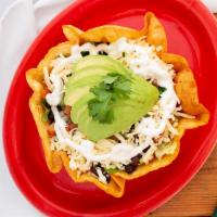 Taco Salad · Mixed greens, black beans, cheese, avocado, pico de gallo and sour cream. Served in a crispy...