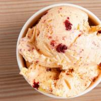 Red Velvet Ice Cream · Cake batter ice cream with red velvet pieces.