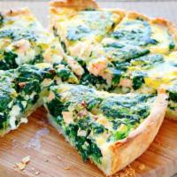 Spanakopita · A traditional Greek pie of spinach, feta cheese and seasonings baked in filo dough, served w...