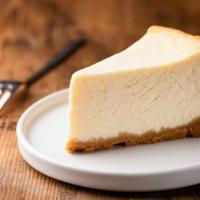 New York Cheesecake · A rich and creamy New York-style cheesecake baked inside a honey-graham crust.