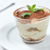 Tiramisu Cup · Slightly sweet and tangy mascarpone whipped cream is layered with spiked-coffee-dipped lady ...