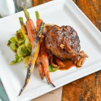 10Oz Filet Mignon · Red wine demi-glace. Served with mashed potatoes and seasonal vegetables.