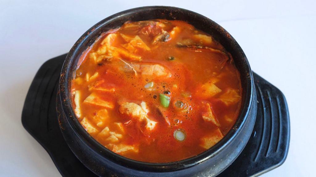 Original Soft Tofu Soup · beef and pork come rice with 4 kind of side dish ( banchan ) kimchi , turnip kimchi , beans sprout anf seasonal green vegetable