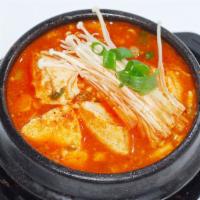 Mushroom Soft Tofu Soup · rice , 4 kind of side dish  kimchi , green vegetable , potatoes  etc