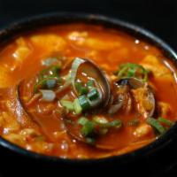 Clam Soft Tofu Soup · clam , rice ,4 kind of side dish