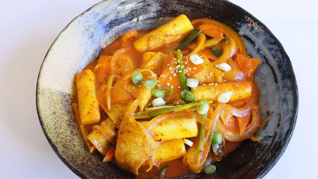Rice Cake Spicy · spicy rice cake - gochujjang sauce ( korean style chili sauce ) 
4 kind side dish (  banchan ) included kimchi , potatoes