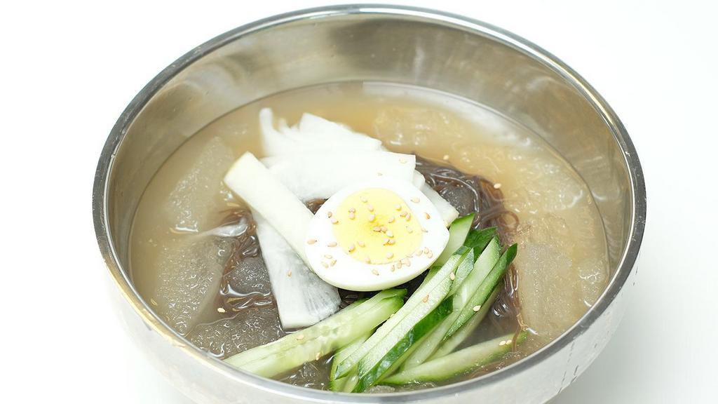 Cold Buckwheat Noodle With Cold Soup · cold buckwheat noodle ( naengmyun ) with chilled soup , 4 kind of side dish included kimchi , potatoes , green vegetable etc