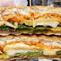 The Buffalo Chicken · Breaded chicken cutlet, melted provolone cheese, lettuce, hot sauce, and blue cheese on home...