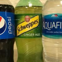 Bottled Soda · Assorted Pepsi products.