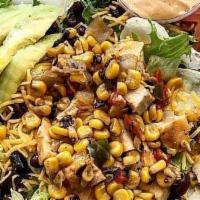 Mexicali Bowl · Black beans, spicy corn mix, avocado, tomato, black olive, shredded Cheddar cheese and chipo...