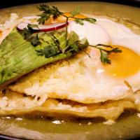 Huevos Rancheros · Sunnyside eggs in a crispy tortilla served with rice, beans and mild green sauce.