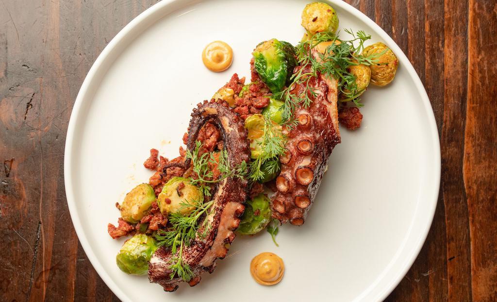 Adelita'S Pulpo · Crispy octopus, brussels sprouts, pico de gallo, chorizo, avocado cream, habanero aioli - rice and beans.