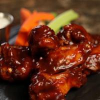 Bbq Wings · 8 pieces of wings with classic BBQ sauce (mild heat).