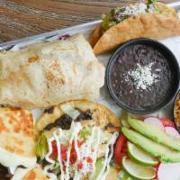Mariachi Plate · A combination of the best we have to offer! Enjoy a medium sized pork burrito, a chicken tos...