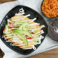 Chimichanga · Our famous crispy chicken or beef chimichanga topped with lettuce, cheese, tomato and sour c...