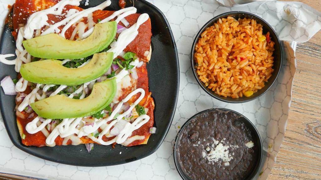 33 Enchiladas · Our chicken enchiladas recipe on corn tortillas, topped with cheese, onions and cilantro. Served with a side of salad, avocado, rice, beans, and sour cream. Please note: enchiladas are not available before 2pm. Thank you.
