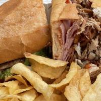Triple Crown Sandwich · Pork. Popular. 12 hours pulled pork, ham, homemade guava BBQ sauce, cheese, and slaw. Comes ...