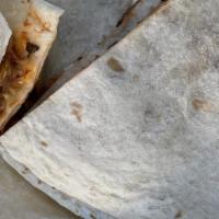 Big Pig Quesadilla · A warm flour tortilla with melted cheese, Guava BBQ sauce, grilled onions, and Kalua pork fo...