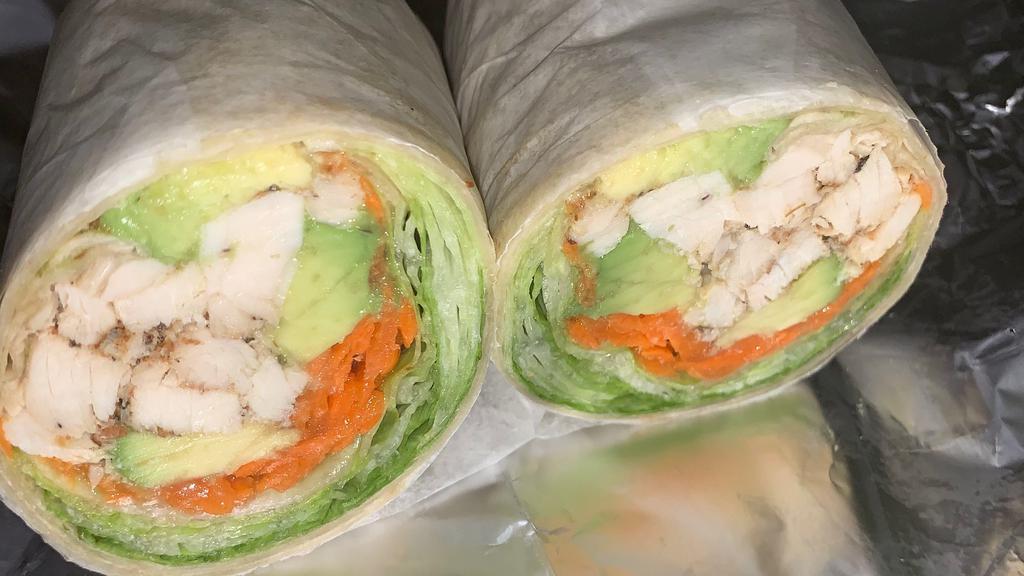 Chicken Avocado Wrap · Grilled chicken, avocado, lettuce, tomatoes, shredded carrots with chipotle mayo on a wrap