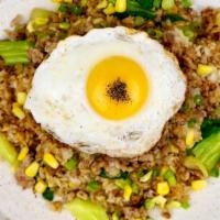 Chicken Fried Rice · Chicken sausage, corn, edamame, baby bok choy, scallions, fried egg (sunny side).