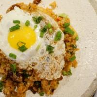 Zutto Fried Rice · Chorizo, kimchi, pastrami, scallions, fried egg (sunny side).