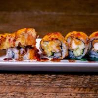 Maine Roll · Lobster tail tempura, tobiko, cucumber & avocado wrapped by soy paper served with spicy aiol...