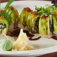Dragon Roll · Eel, cucumber, topped with avocado & tobiko.