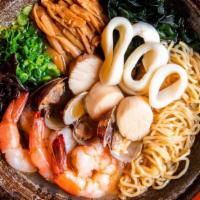 Seafood (Tonkotsu) Ramen · Pork & seafood broth served with thin curly noodles head-on shrimp, manila clams, scallops, ...