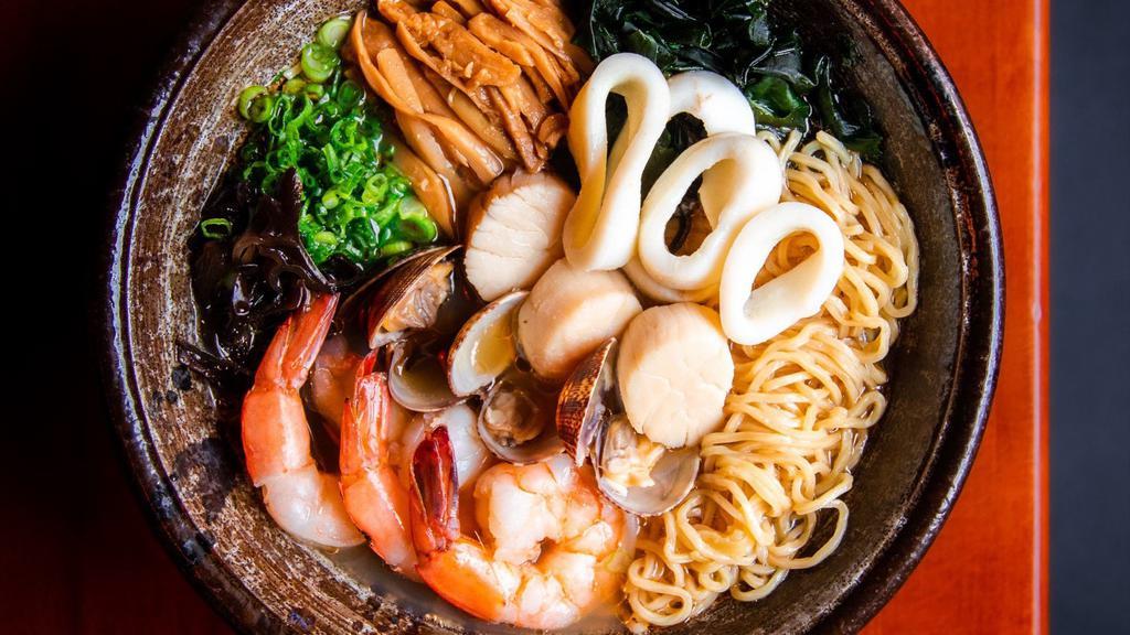 Seafood (Tonkotsu) Ramen · Pork & seafood broth served with thin curly noodles head-on shrimp, manila clams, scallops, kikurage, menma, scallion, wakame & nori, lobster oil.
