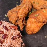 Fried Chicken Dinner · Fried Chicken Dinner with home made sauce, served with either white rice or rice and beans. 🌟